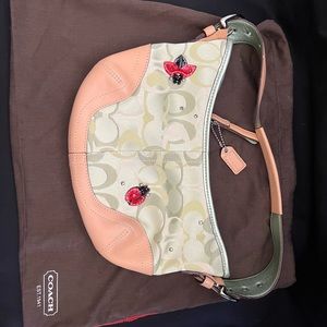 Authentic Coach purse with beaded ladybug detail